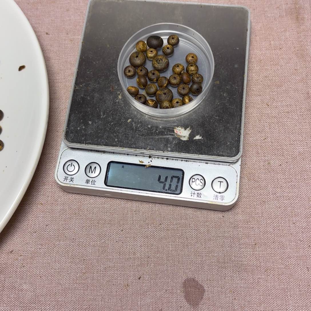 凉***哥木奇楠原材料散算盘珠4克