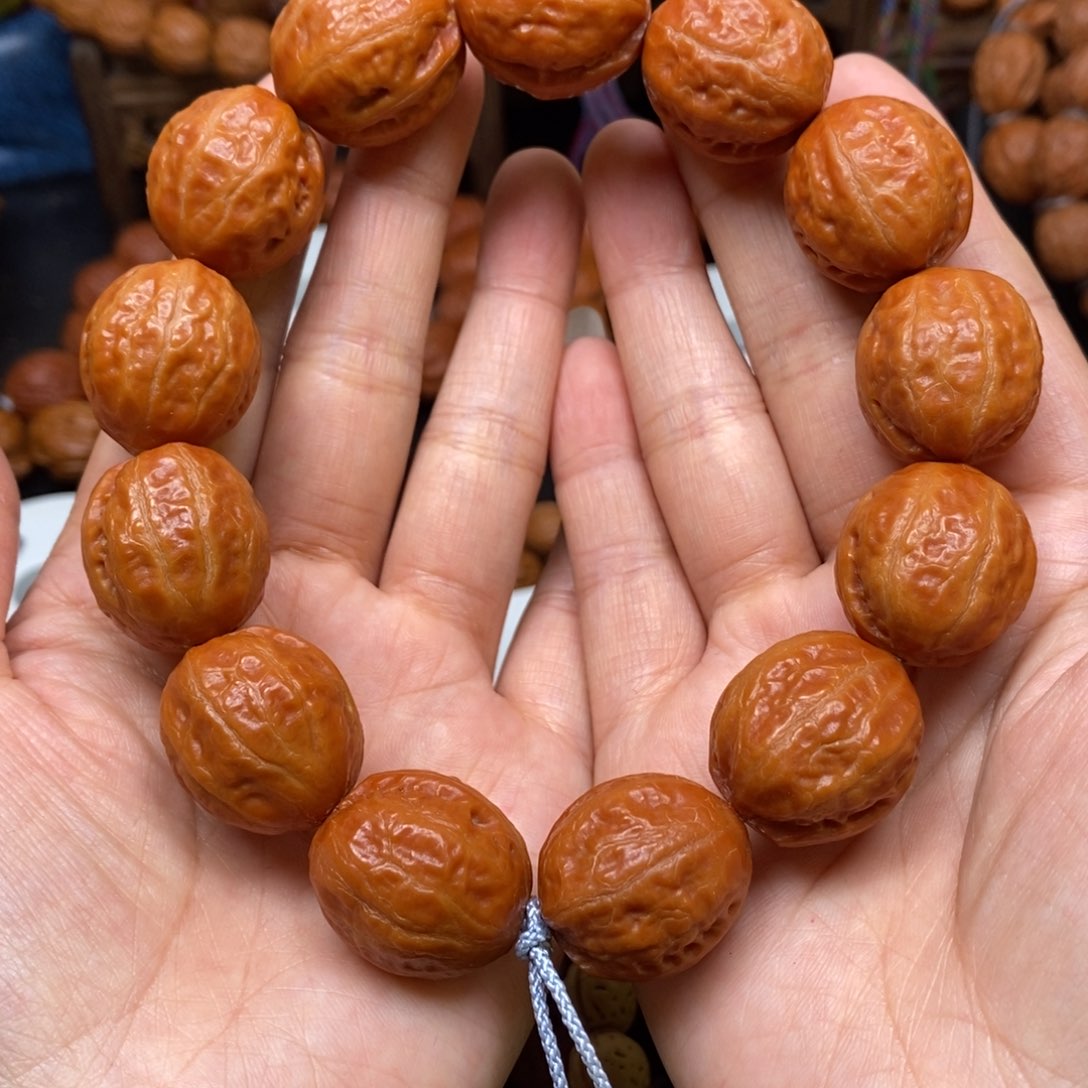 桃核手串贪****s富甲光头