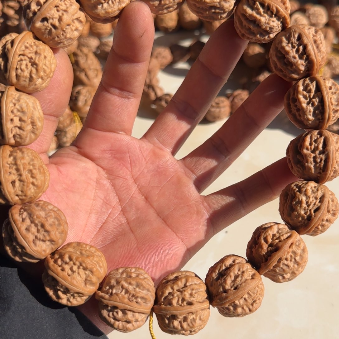 k***.文玩核桃吊坠磨盘小核桃