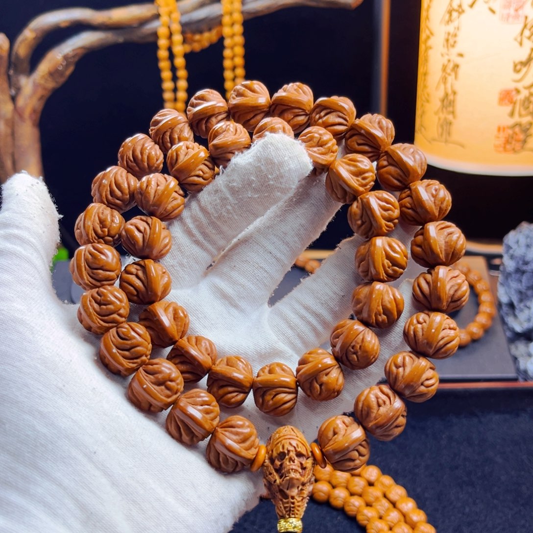 矜***。桃核吊坠野生桃核