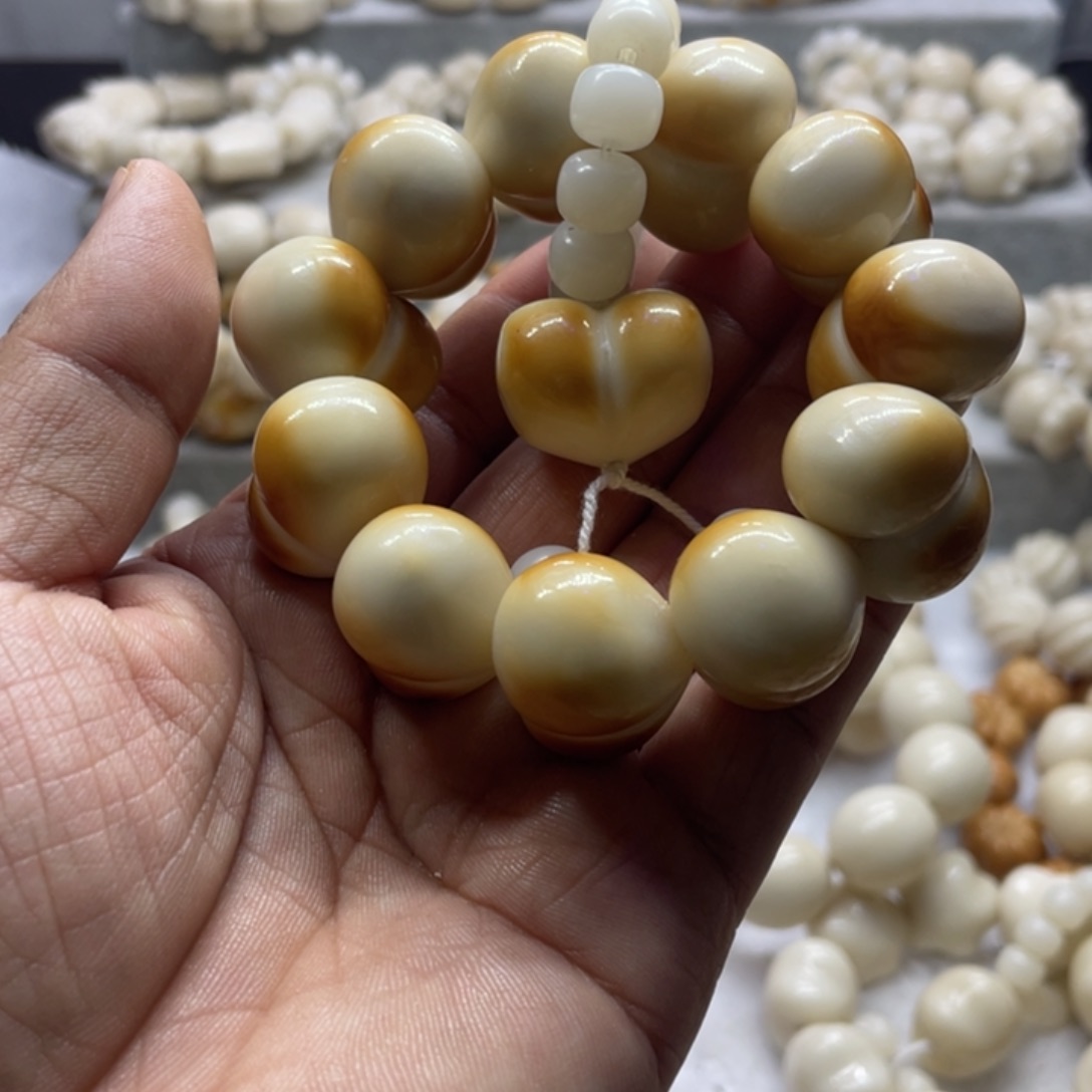 菩提根/象牙果吊坠全品象牙果光面屁桃手串卡25
