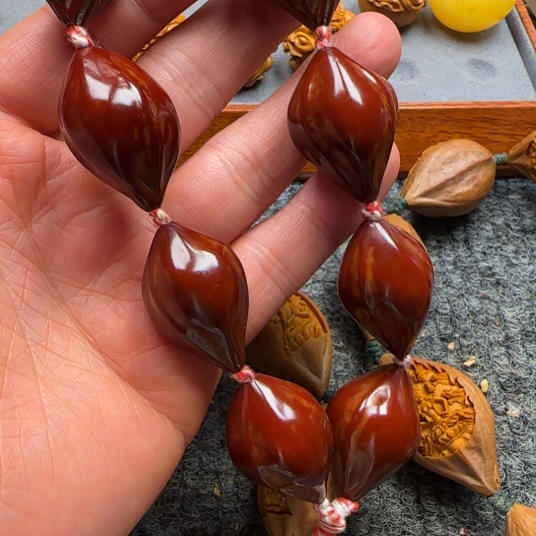 专***者橄榄核吊坠………………