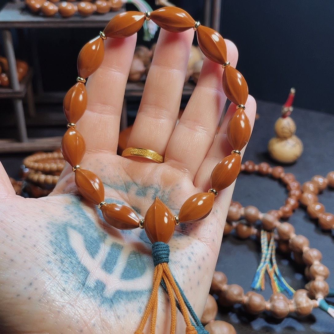 新***利橄榄核手串/手链1.0高抛鲨鱼背