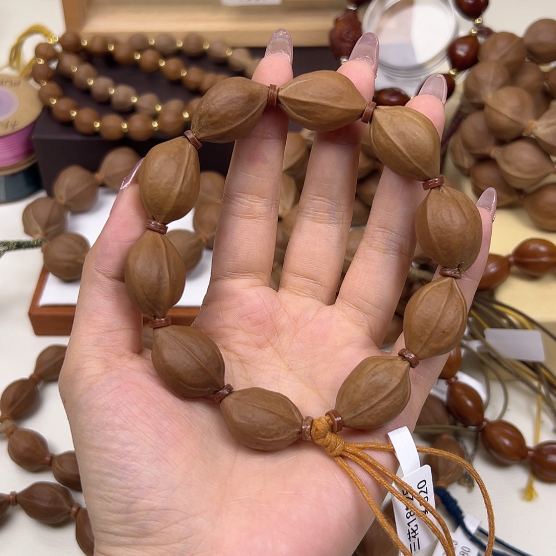 蹦***恰橄榄核手串/手链三花18.25