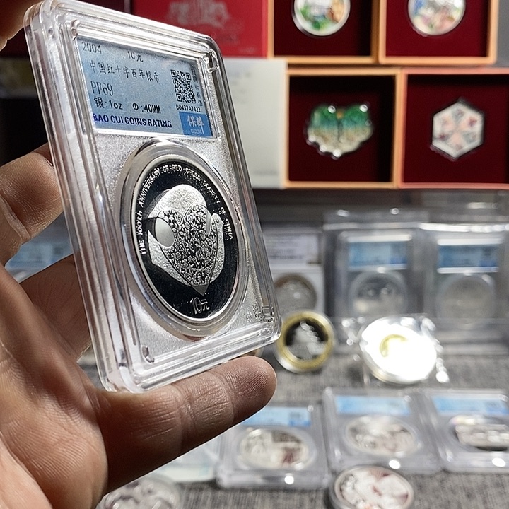 纯银无盒证特价04年红十字百年银币一枚如图