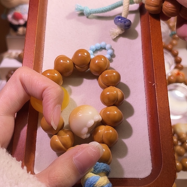 我***呀吊坠猴头核桃猴头屁桃手持