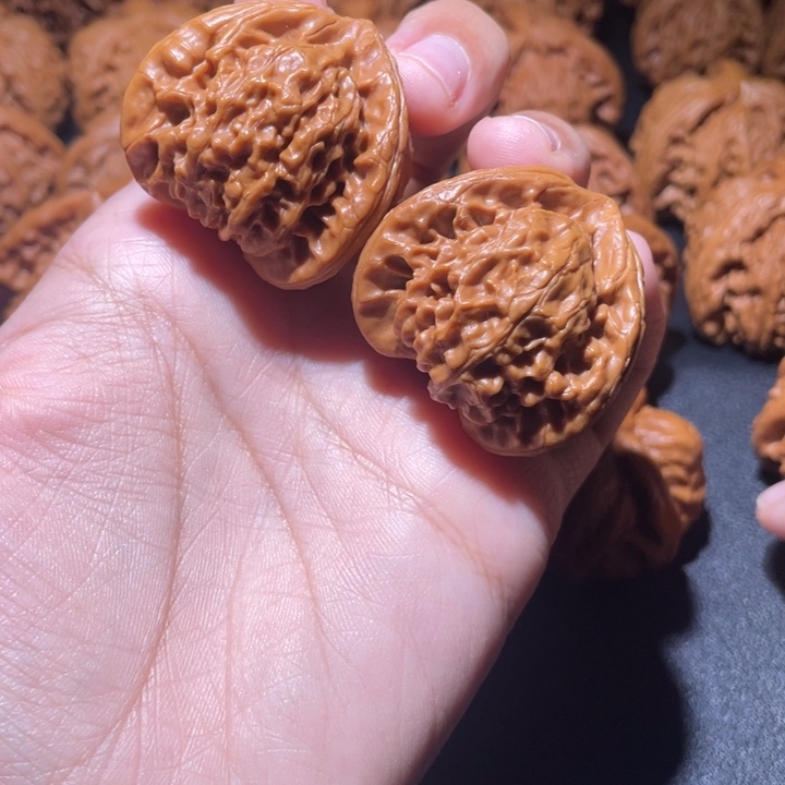 朱***门吊坠桃核小妹三棱