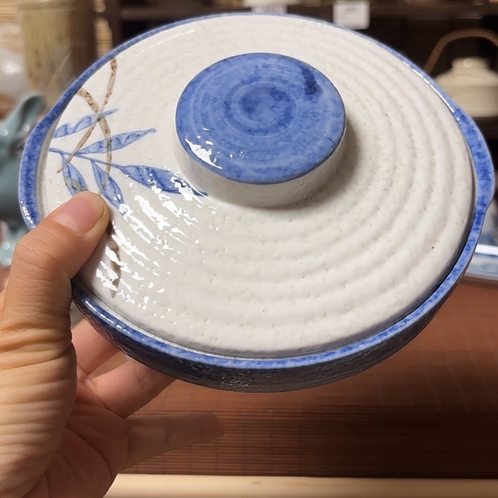 瓷片喵喵笑得想头昏