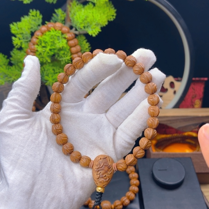 桃核吊坠@****哥野生桃核手持小尺寸