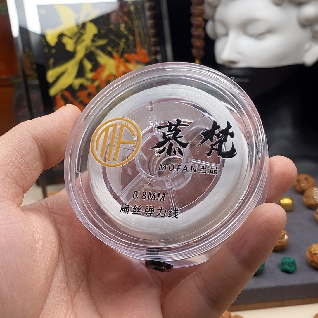 重***.吊坠猴头核桃弹力线