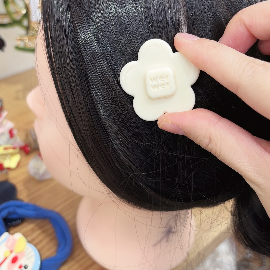 皮质铁合金小号花朵奶黄