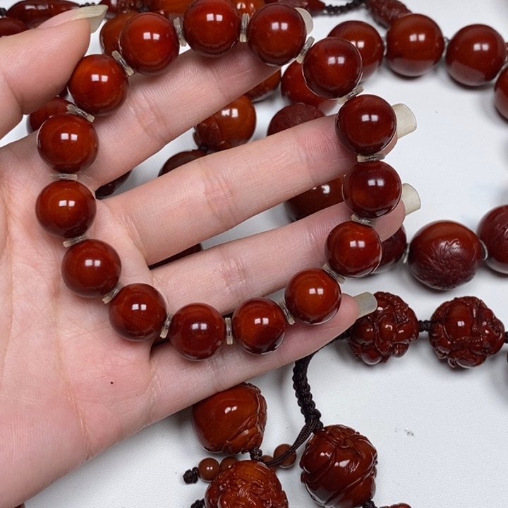 欢***️橄榄核雕刻工艺的发展