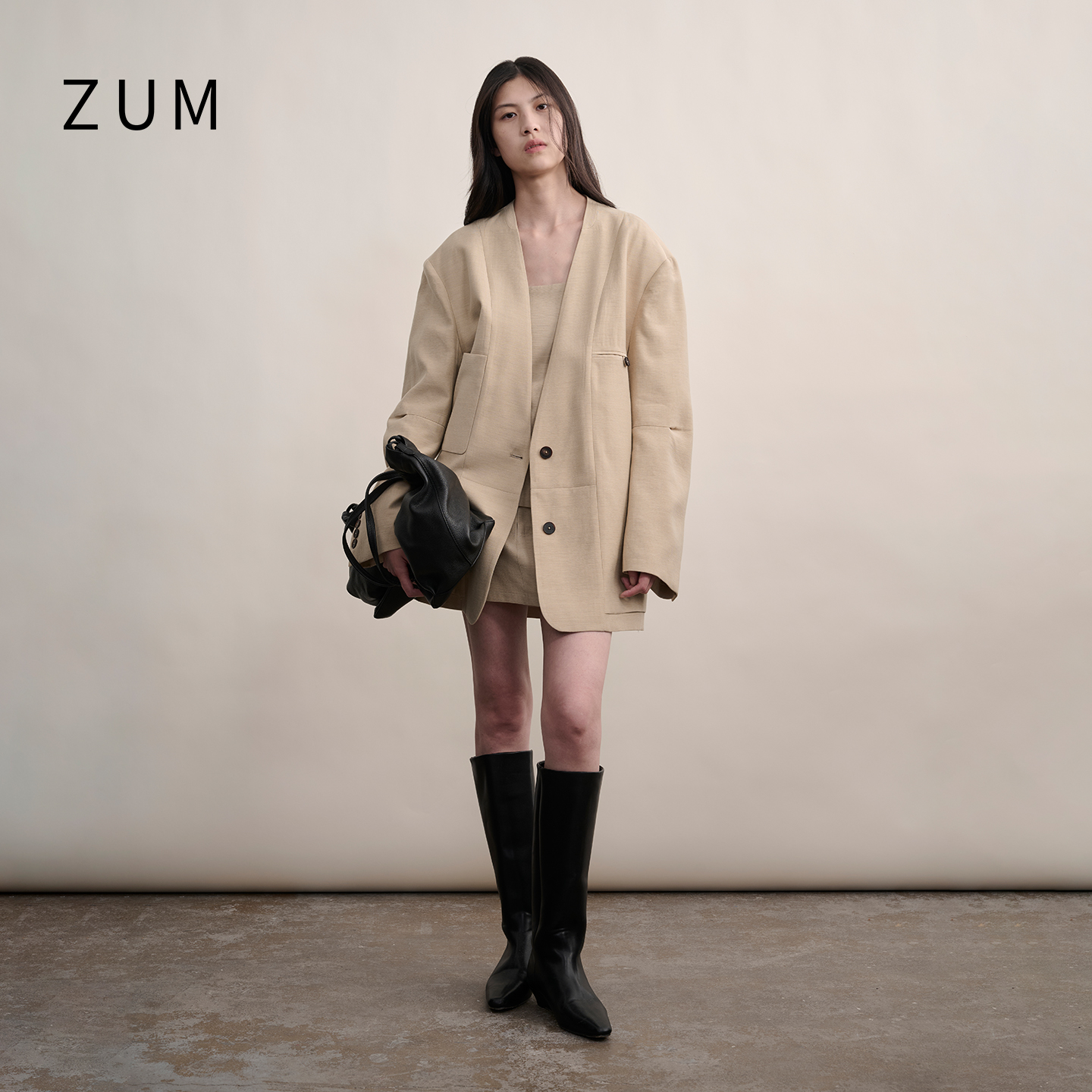 ZUM 杏色宽松廓形西装女25秋新款双口袋收腰抹胸上衣小A短裙套装