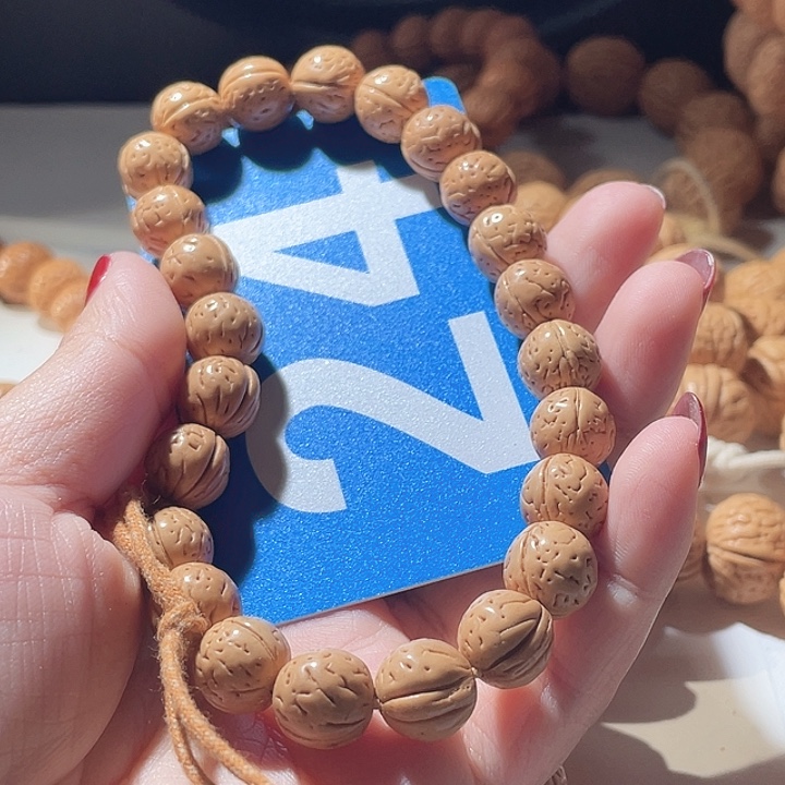 乐***遥吊坠桃核桃核手串野生24