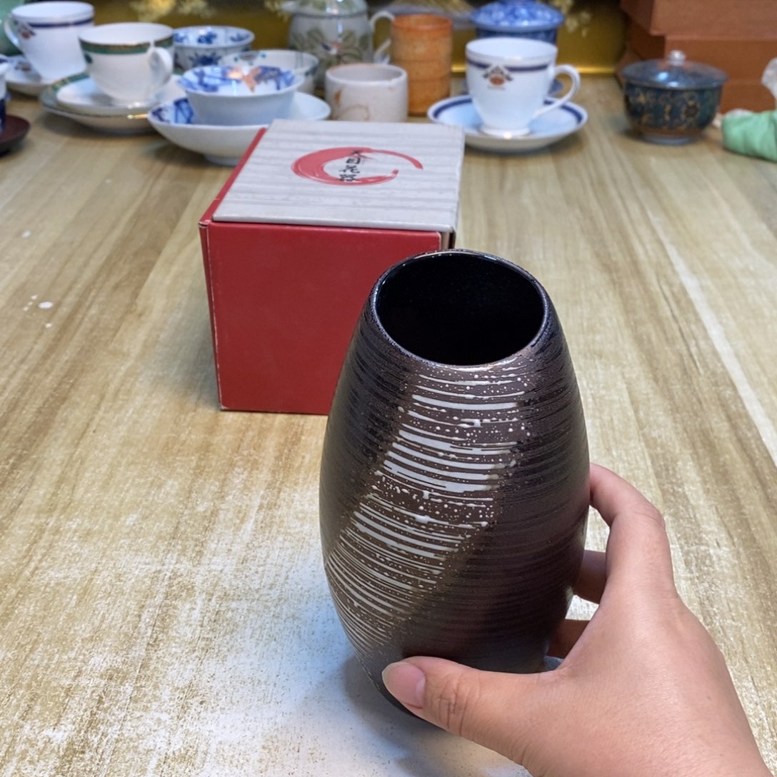 浅***秋瓷片易雅集工艺品有限公司