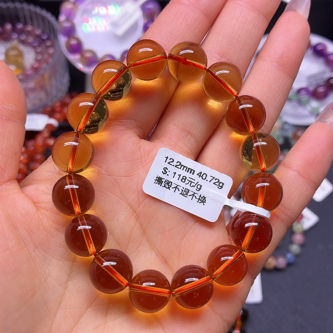 橙****水晶手链未镶嵌手链