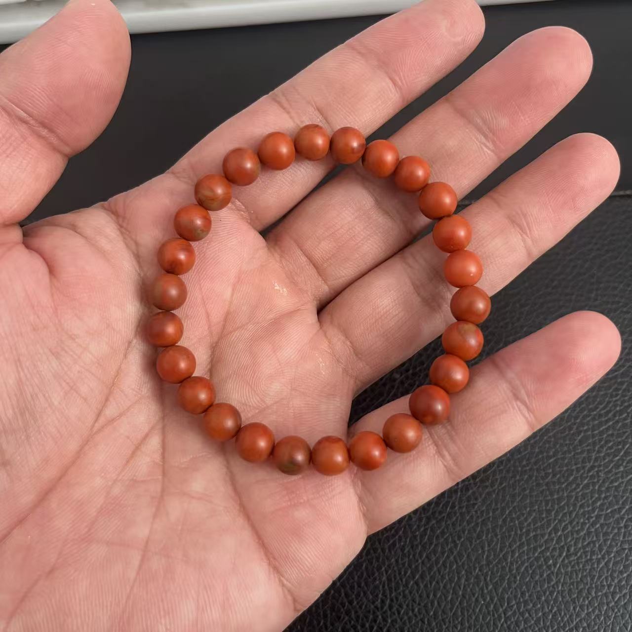 四川鸡血包浆南红圆珠手串