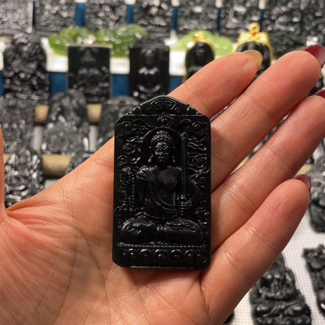 蛇纹石玉未镶嵌吊坠正**明