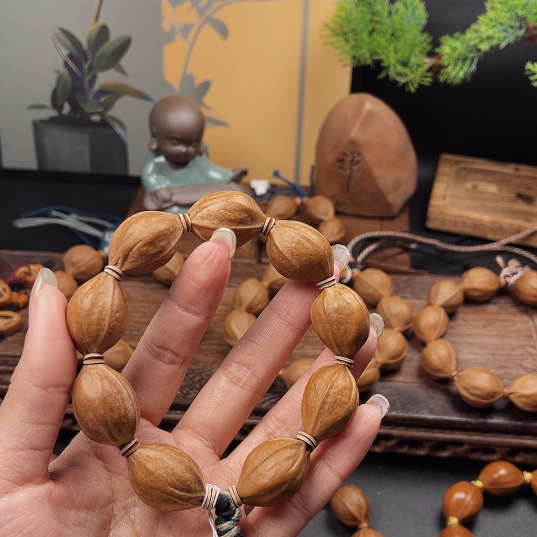 吊坠橄榄核我****。梅林铁核19.27