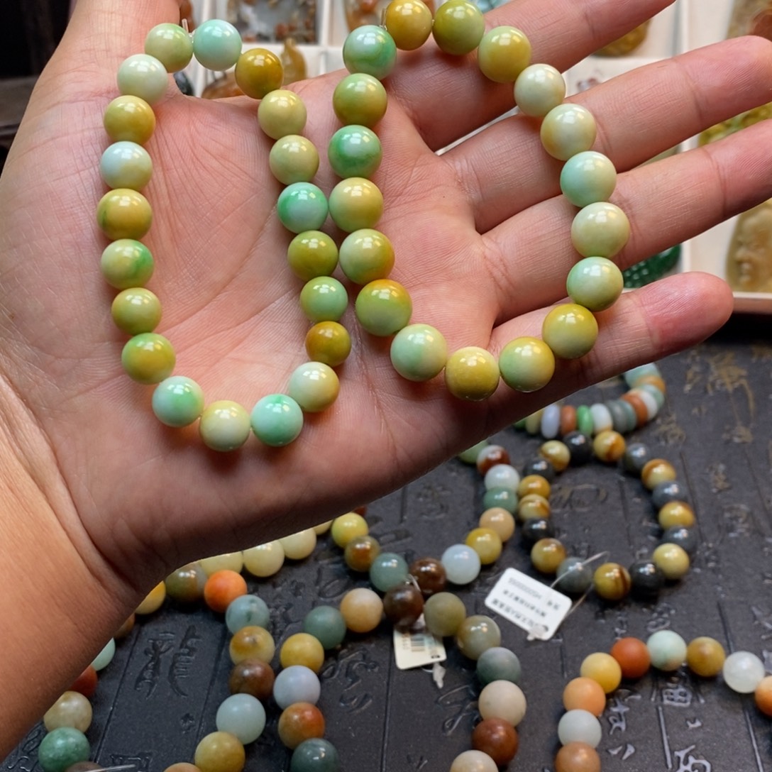洗****翡翠未镶嵌手串黄加绿