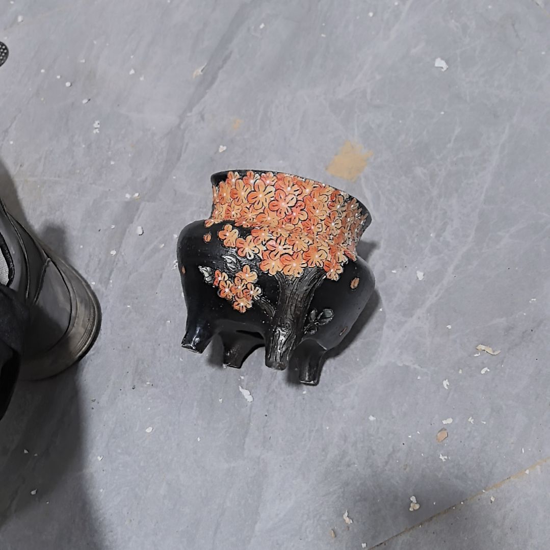 罗***周红泥花盆瑕疵处理