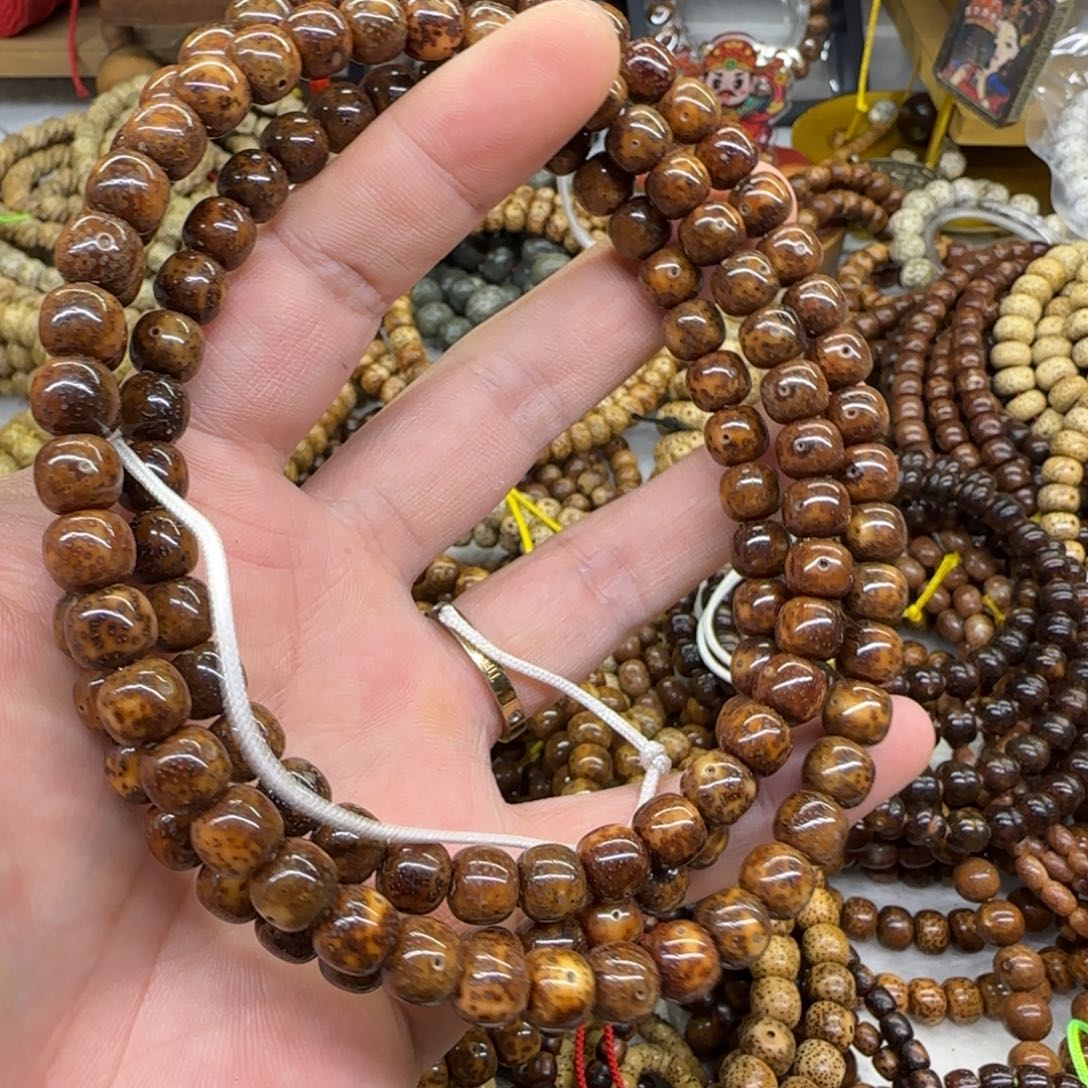 钦****吊坠星月菩提9*8陈籽虎皮脖挂