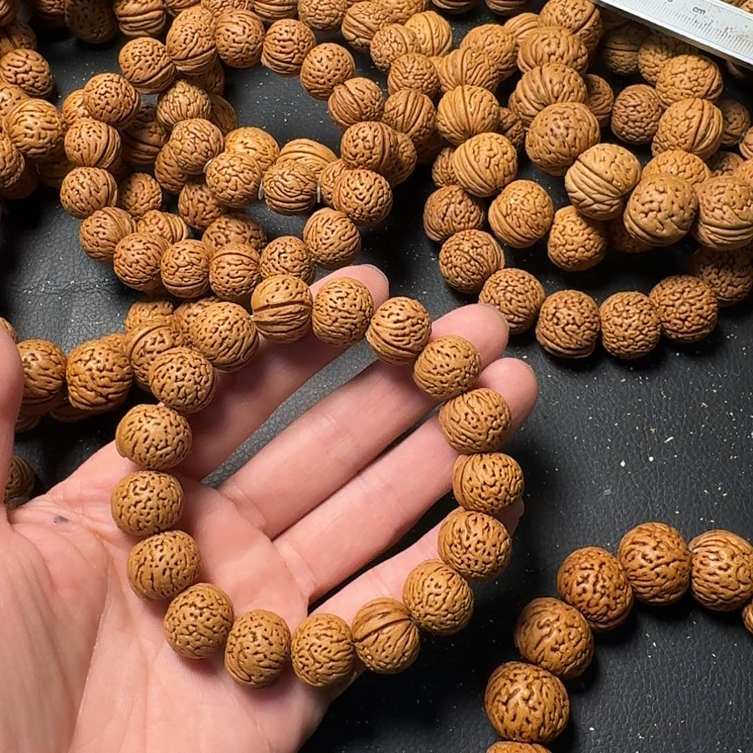 小****桃核吊坠南瓜手串