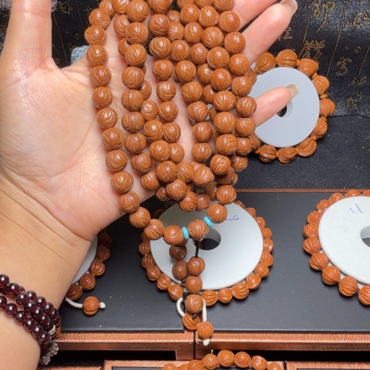 紫***馆手串桃核玉龙脊博挂