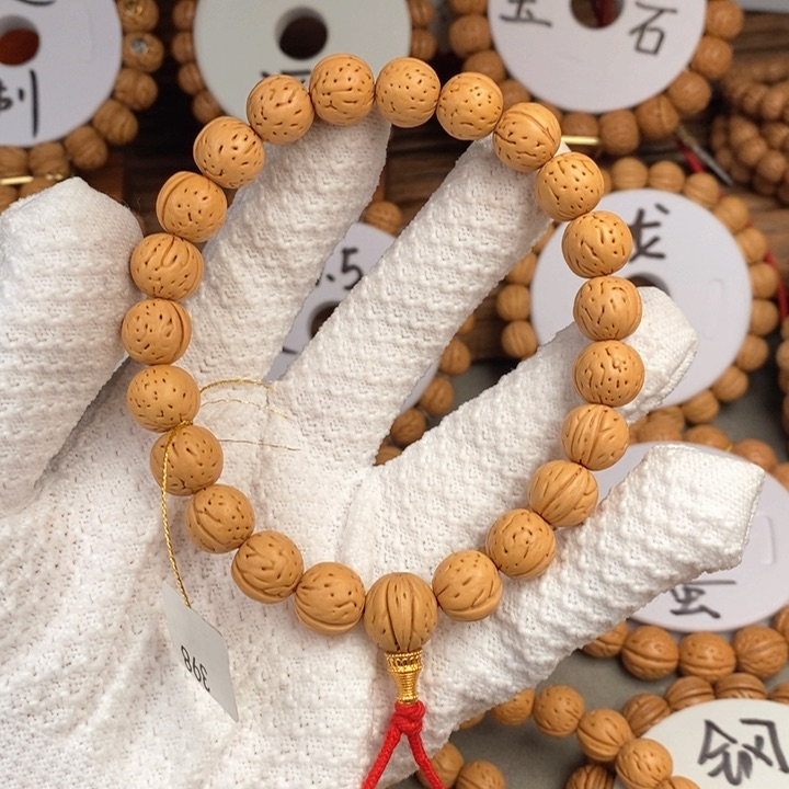 桃核手串山****司金蝉子12S抛光板尺寸误差0.5之间