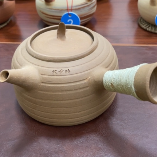 ?*摆烧水壶则把一把