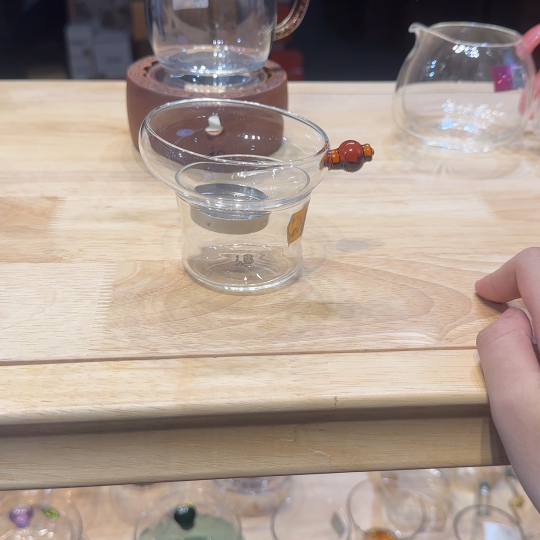 小****禾器奉珠激光茶漏琥珀色