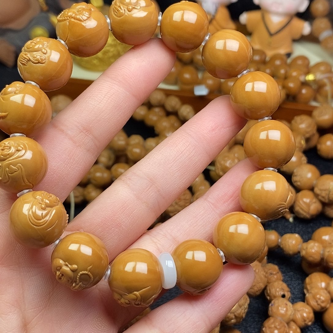 渡***猴头核桃手串百态弥勒