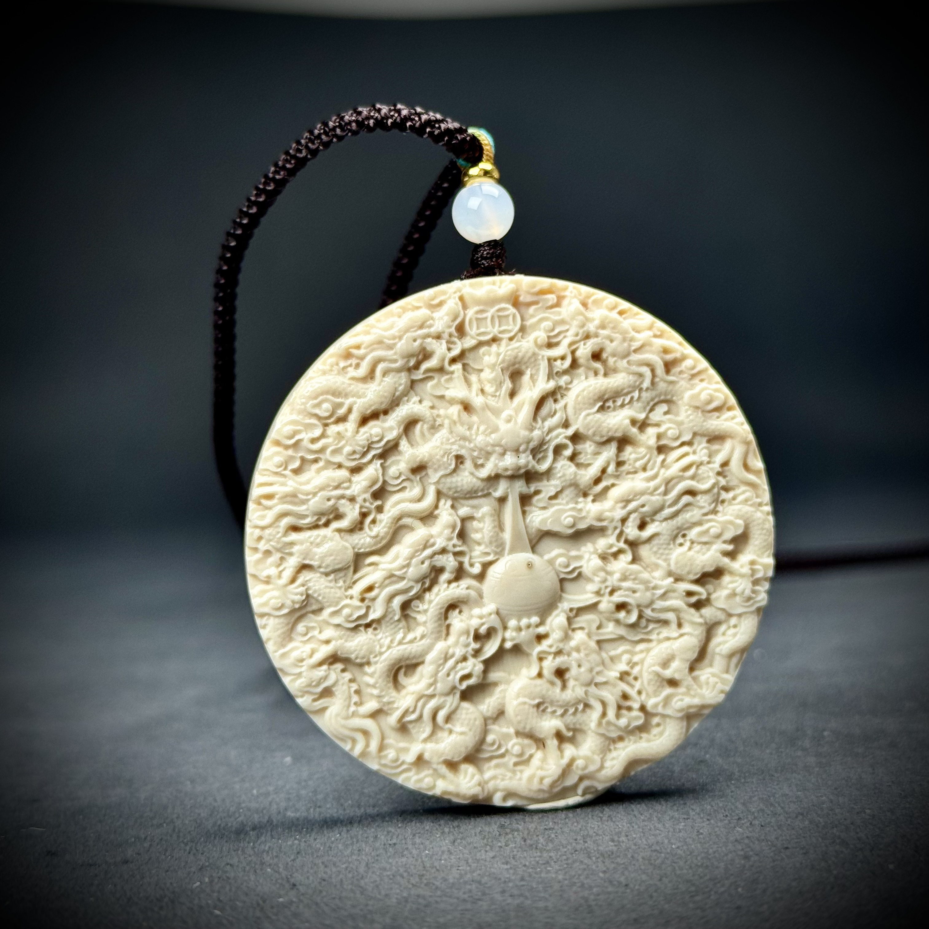 H92-72天然猛犸象牙雕刻九龙戏珠52*7.5mm一物一图 假一罚十