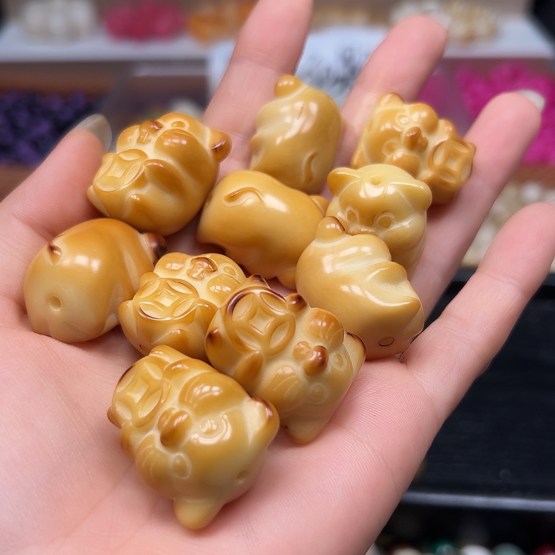 菩提根/象牙果手串微瑕炭烤抱钱猪10颗有裂
