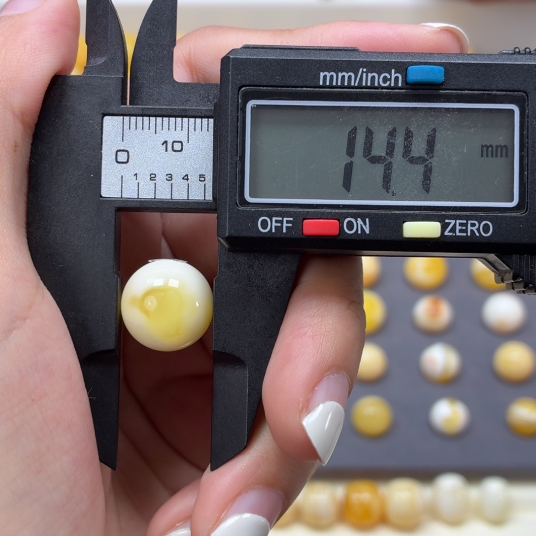 琥珀未镶嵌裸石焦皮金橘溶洞奶瓷白14.4mm