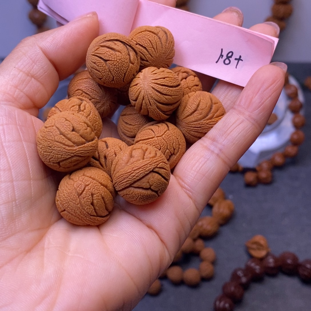 牧***人秦岭龙纹桃核14颗