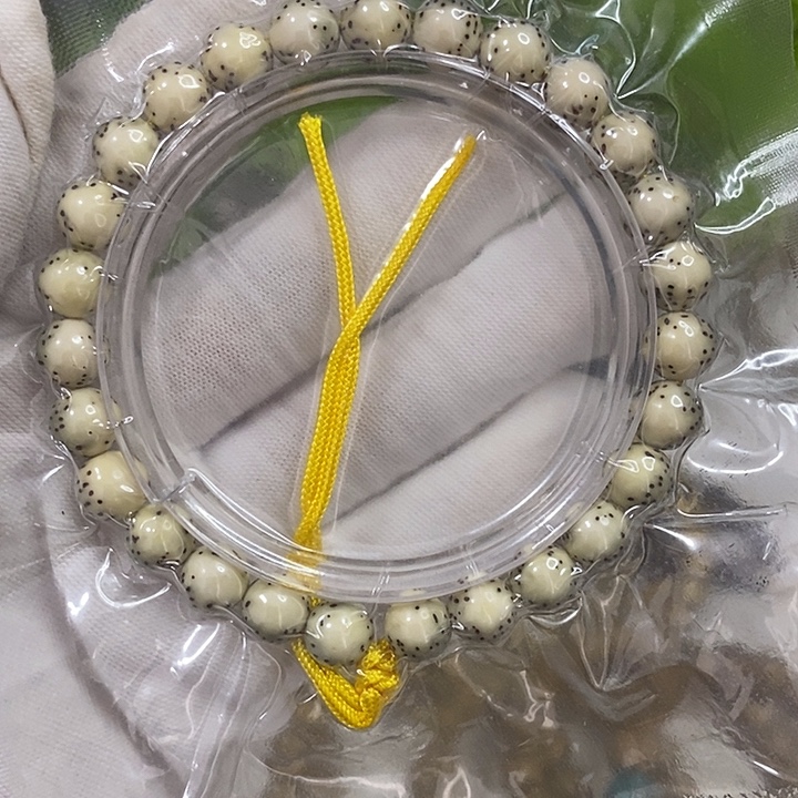 星月菩提吊坠海南星月菩提手串8绿包白圆珠手持