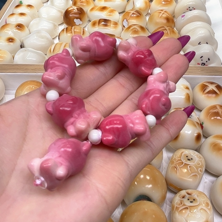 白玉菩提把件2.15.46象牙果粉色渐变小熊