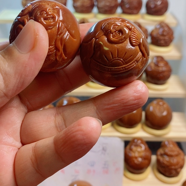 白***生橄榄核把件巴西进口大橄榄核笑佛一对