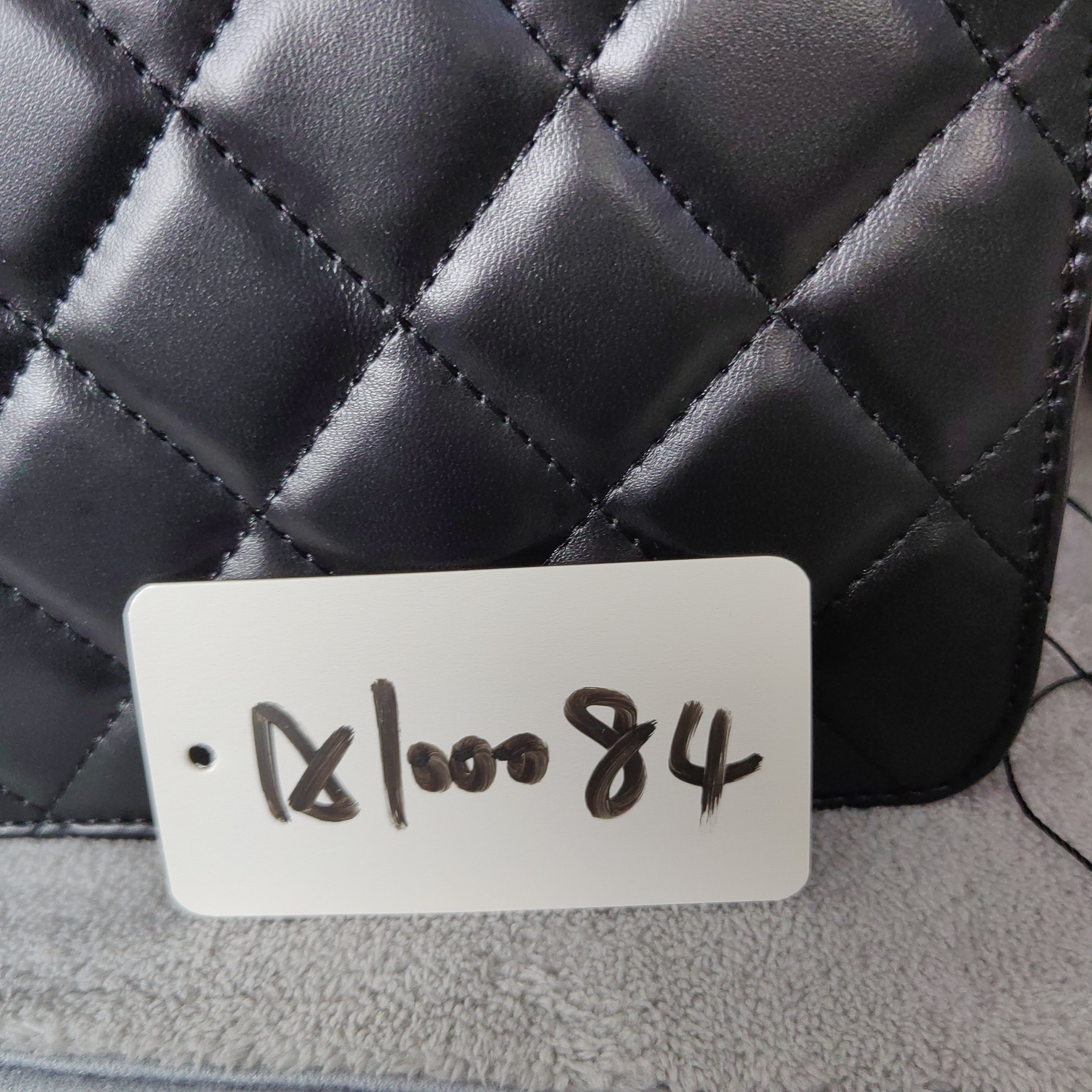 A100084羊皮黑色手提CF皮皮包包