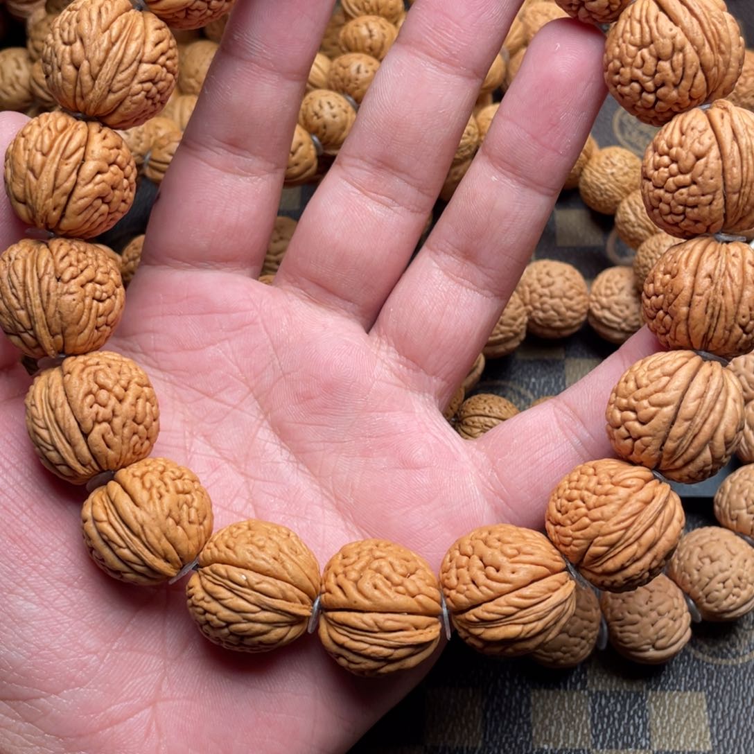 桃核吊坠友****心龙鳞王龙鳞王