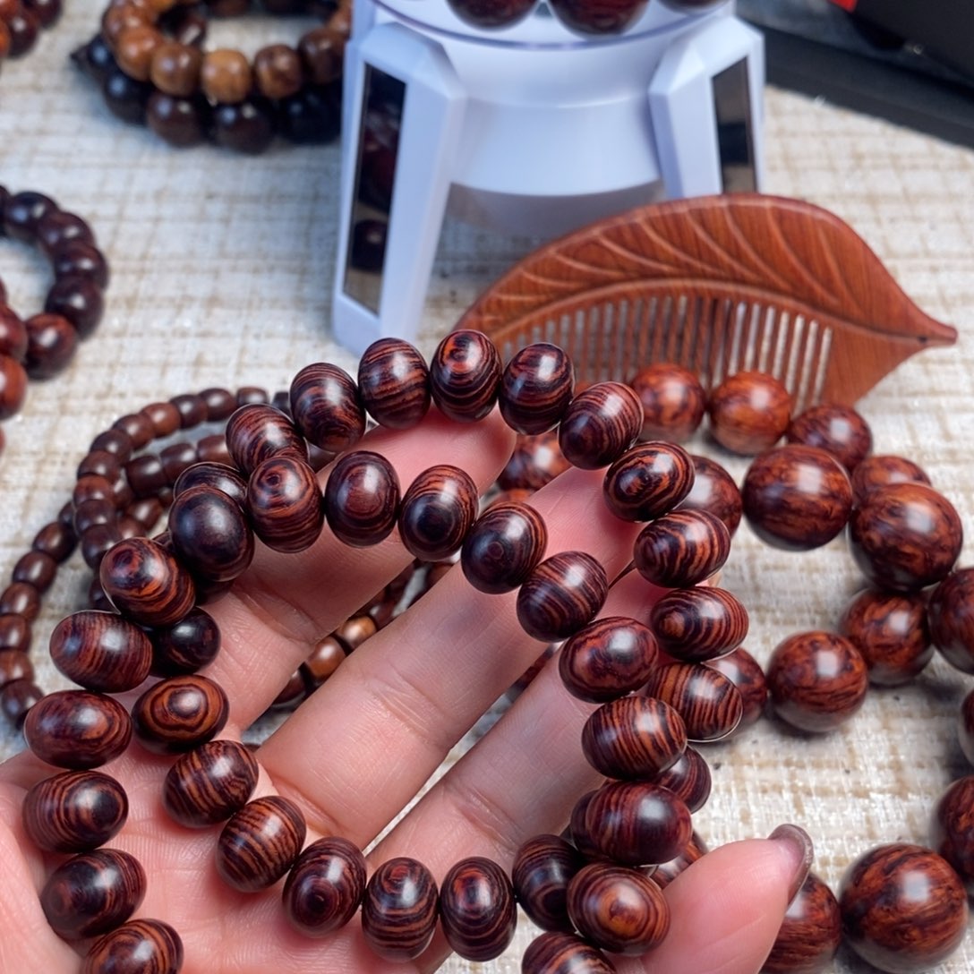 中***强木质类1.2红降花梨公算盘珠两条