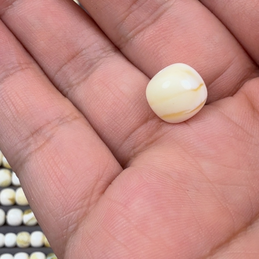 K***。定制琥珀10*11金白虎皮一线老型