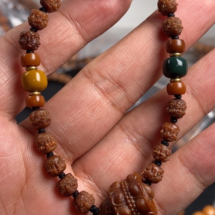 橄榄核吊坠吧发布