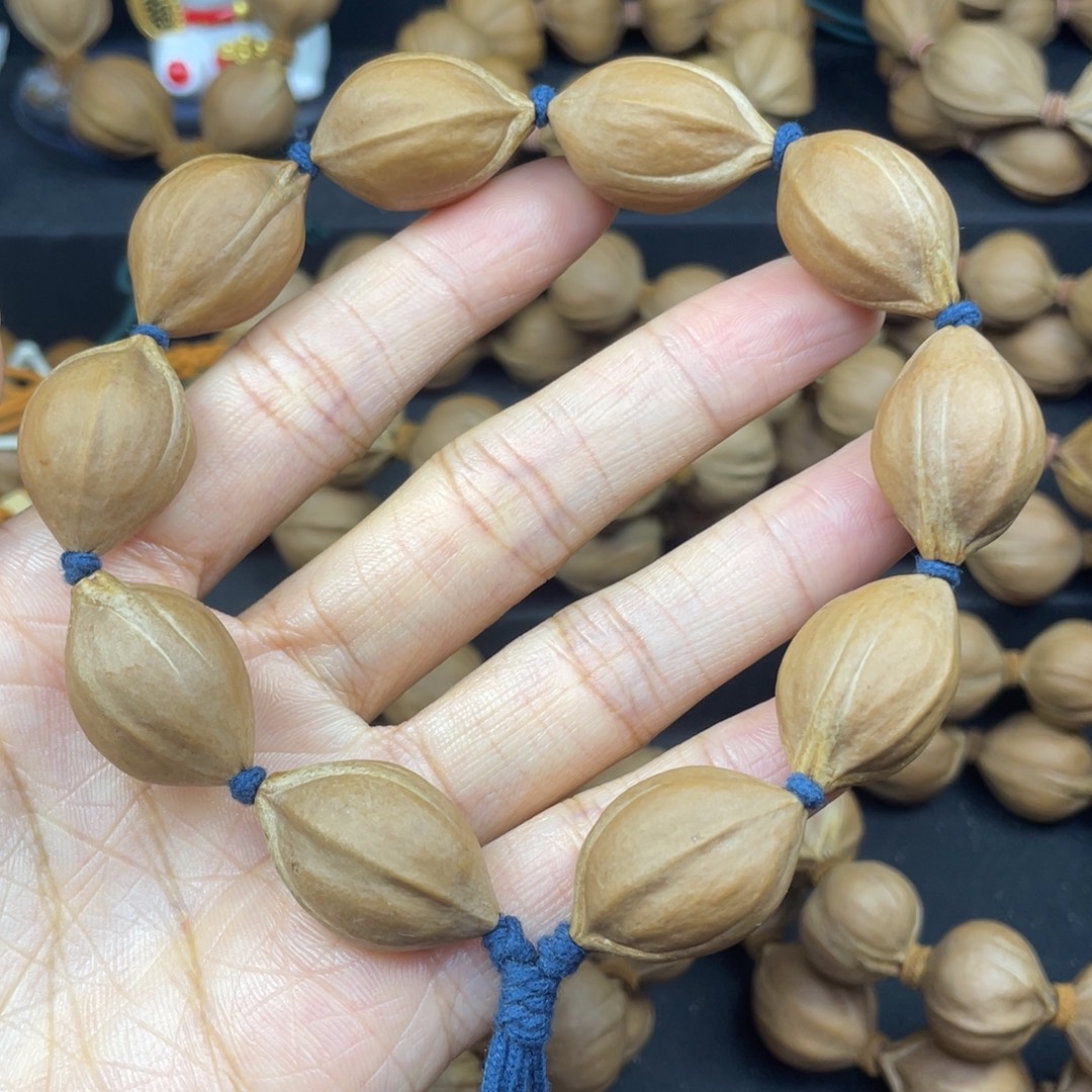 002橄榄核三花1.7