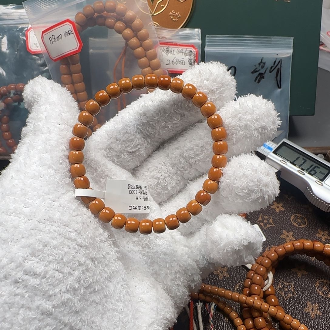 阿***5橄榄核手串/手链6.6mm老挝核尖极限弧单圈三花无白
