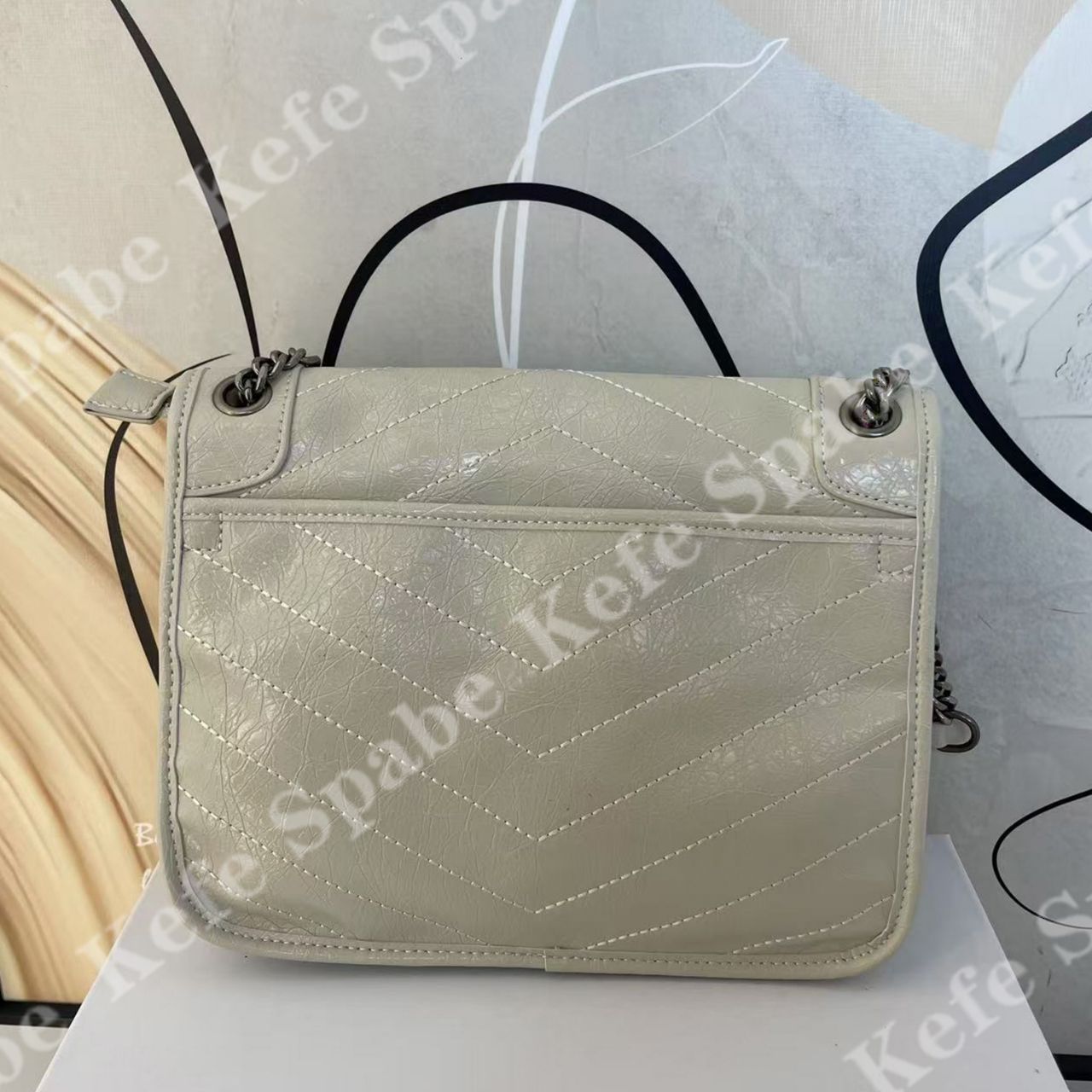 HM002   P25新款奶白大号流浪链条单肩斜挎包-1