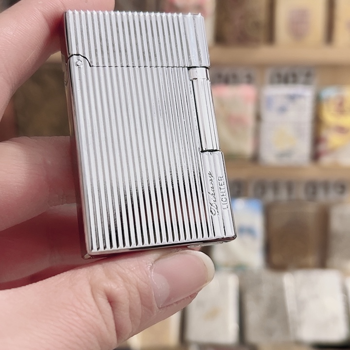 银色竖条纹侧滑火机特价