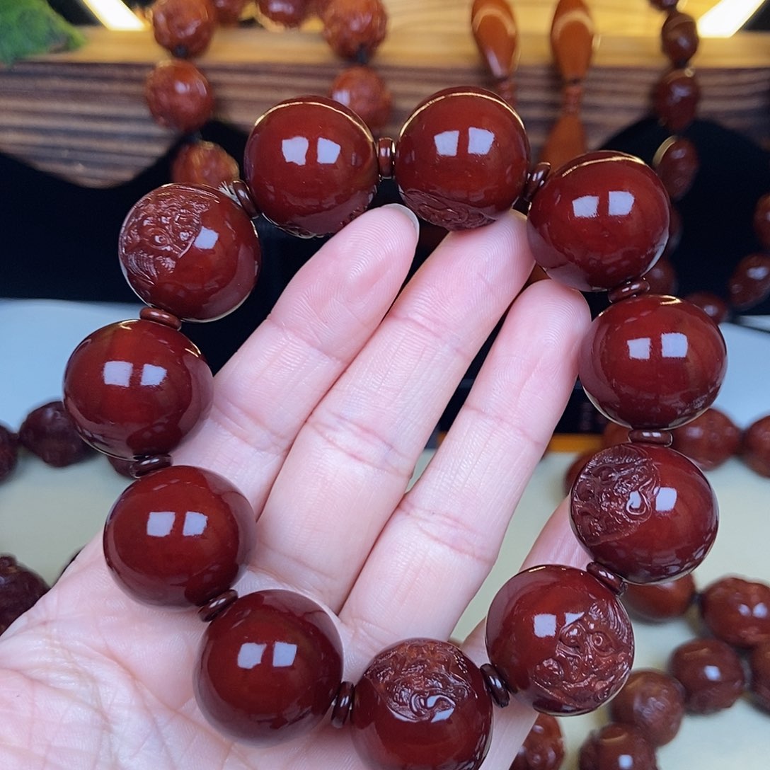 橄榄核吊坠餓**說佛魔一念