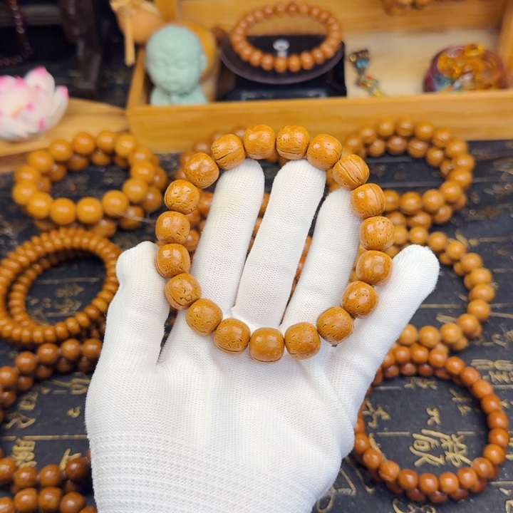 仚***冚桃核手串13尺寸老邢